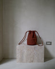 Natural-Dyed Woven Drawstring Bucket Bag